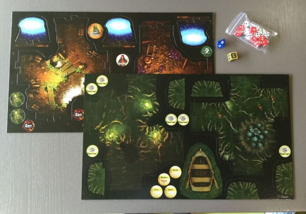 The map tiles are all sorts of shapes that fit together like a jigsaw to make up the game board as you explore. Here are a few of the tiles waiting to be punched out.