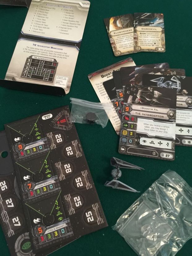 The TIE Interceptor is a fast ship. It comes with lots of bits.