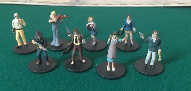 You do not get these figures with the game. These are part of the full set of Arkham Horror investigator miniatures. They have the same characters in both games.